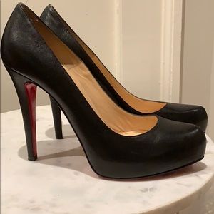 Christian Louboutin pumps gently worn